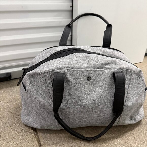 lululemon athletica Handbags - Lululemon "Out Of Range" Duffel 33L